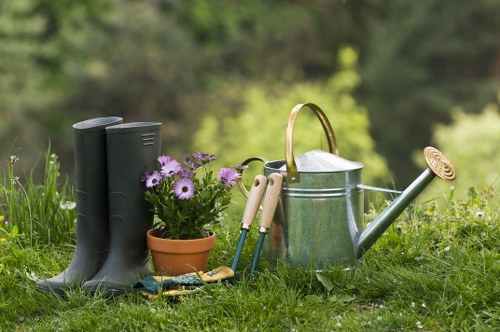 Design elements including plants, hardscaping, and water features in Honor Oak